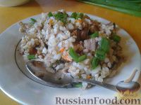 Фото к рецепту: Гречнево-рисовая каша с мясом