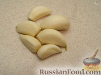 Фото приготовления рецепта: Закуска из кабачков с чесноком и помидорами - шаг №4