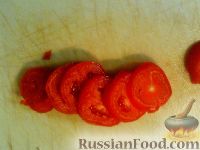 Фото приготовления рецепта: Баклажан, запеченный с сыром и помидорами - шаг №2