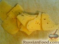 Фото приготовления рецепта: Баклажан, запеченный с сыром и помидорами - шаг №3