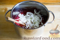 Фото приготовления рецепта: Салат из огурцов и баклажанов в томатном соусе (на зиму) - шаг №8