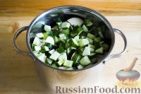 Фото приготовления рецепта: Салат из огурцов и баклажанов в томатном соусе (на зиму) - шаг №10