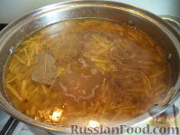 Фото приготовления рецепта: Гороховый суп с копченостями - шаг №10