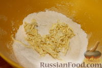 Фото приготовления рецепта: Рис с куриными сердечками и замороженными овощами - шаг №11