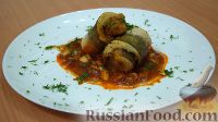 Фото приготовления рецепта: Тушеный хек в томатном соусе с овощами - шаг №11