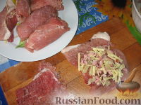 Фото приготовления рецепта: Свиные рулеты с ананасами - шаг №3