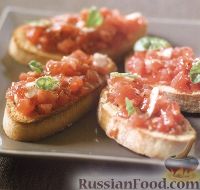 Фото к рецепту: Чесночные тосты с помидорами и базиликом