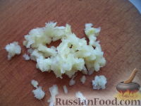 Фото приготовления рецепта: Цветная капуста, запечённая с сыром и сметаной - шаг №5