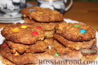 Фото приготовления рецепта: Овсяное печенье с орехами и разноцветным драже - шаг №7