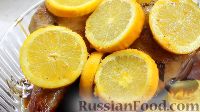 Фото приготовления рецепта: Запеченная индейка с апельсинами - шаг №13