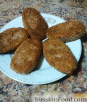 Фото к рецепту: Картофельные котлеты с рисом и грецкими орехами