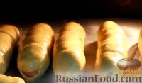 Фото приготовления рецепта: Сосиски в дрожжевом тесте - шаг №13