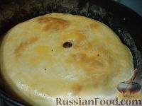 Фото приготовления рецепта: Пирог с квашеной капустой - шаг №19