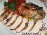 Фото к рецепту: Куриные грудки с тушеными помидорами
