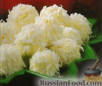 Фото к рецепту: Кокосовые шарики из ананасов со сливочным сыром