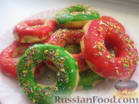 Фото к рецепту: Вкусные пончики с глазурью (в духовке)