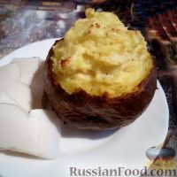 Фото к рецепту: Запеченный картофель, фаршированный сырной начинкой