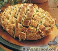 Фото к рецепту: Закусочный хлеб с сыром и луком