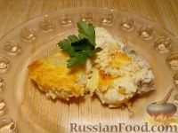 Фото к рецепту: Судак с картофелем под сырным соусом