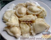 Фото к рецепту: Украинские вареники с творогом