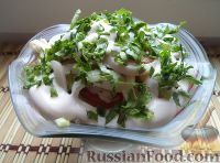 Фото к рецепту: Салат из кальмаров, свежих помидоров и огурцов