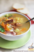Фото к рецепту: Гороховый суп на копченых ребрышках