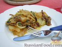 Фото к рецепту: Картофельная запеканка с белыми грибами (Tiella di patate e funghi)