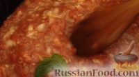 Фото приготовления рецепта: Фаршированные кабачки в томатном соусе - шаг №9