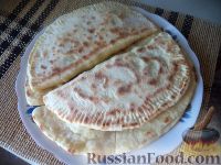 Фото приготовления рецепта: Лепешки с зеленью и сыром (по-кавказски) - шаг №13