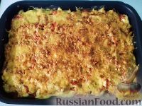 Фото к рецепту: Картофель с ветчиной и помидорами, под сырной корочкой