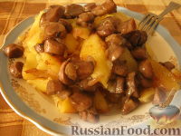 Фото к рецепту: Картофель жареный с грибами