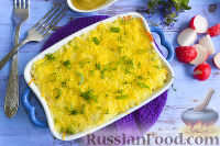 Фото к рецепту: Картофельная запеканка с консервированными кальмарами и сыром