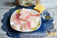Фото приготовления рецепта: Рыба, запеченная с кабачками и помидорами - шаг №4