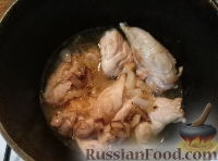 Фото приготовления рецепта: Кролик тушеный с рисом - шаг №6
