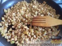 Фото приготовления рецепта: Перец, фаршированный рисом и баклажанами - шаг №5