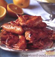 Фото к рецепту: Куриные крылья с апельсиновым соком