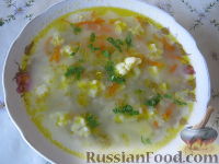 Фото приготовления рецепта: Суп с цветной капустой и горошком - шаг №4