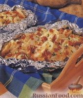 Фото к рецепту: Картофель, запеченный с сыром на гриле