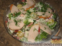 Фото приготовления рецепта: Закусочный морковный рулет с сыром и крабовыми палочками - шаг №21