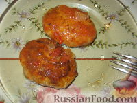 Фото к рецепту: Котлеты рыбные в томатном соусе