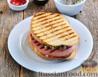 Фото приготовления рецепта: Порилайнен (финский бутерброд с вареной колбасой) - шаг №9