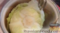 Фото приготовления рецепта: Как быстро и легко снять листья с капусты для голубцов - шаг №6