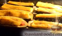 Фото приготовления рецепта: Фаршированные баклажаны, запеченные в духовке - шаг №8