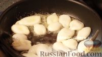 Фото приготовления рецепта: Кальмары в чесночно-ореховом соусе - шаг №3