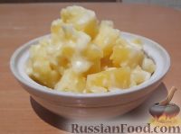 Фото к рецепту: Картофель тушеный в молоке