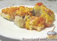 Фото к рецепту: Запеченная рыба под томатно-сырной корочкой
