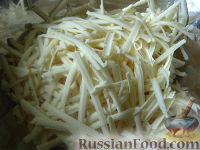 Фото приготовления рецепта: Сырные шарики в ореховой крошке - шаг №3