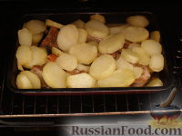 Фото приготовления рецепта: Свиные ребрышки, запеченные в духовке - шаг №8