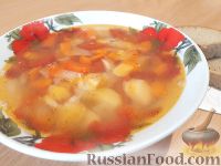 Фото к рецепту: Куриный суп со сладким перцем и помидорами