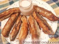 Фото приготовления рецепта: Одесская рыбка "Цаца" (жареная мойва) - шаг №9